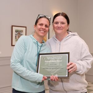 Lori St. John receives Achievement Award certificate from Julia MacDonald at Uxbridge Fair AGM