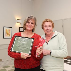 Roberta Bustard receives Achievement Award certificate from Bev Latva at Uxbridge Fair AGM