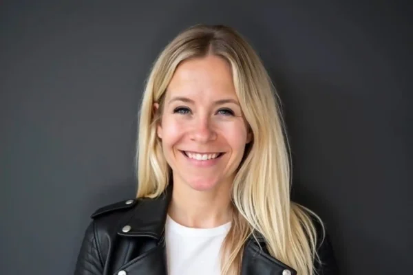 Tara Acton, line dancing instructor with Step In Time Country, smiling in a headshot photo